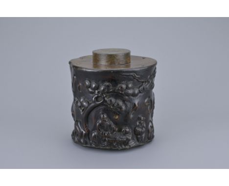 A CHINESE HARDWOOD ZITAN TEA CADDY 19/20TH CENTURY. Of cylindrical form carved in relief with scholar figure drinking tea und