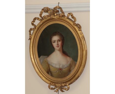 British School (19th century) Portrait of a lady in a yellow dress adorned with jewels Oil on canvas, 60cm by 48cm, oval, in 