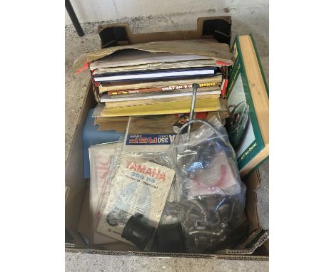 Box containing various manuals, magazines etc for various makes and models of motorcycles and cars to include Yamaha RD250 an