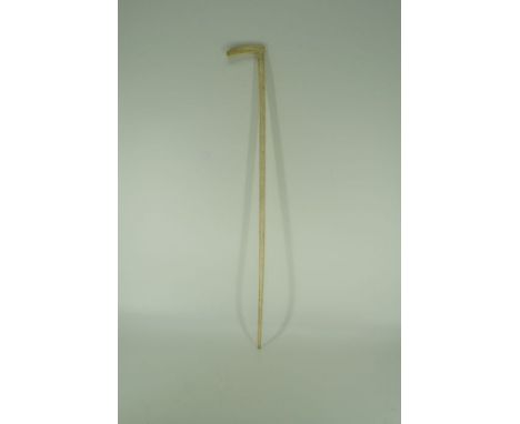 A whalebone walking stick Late 19th Century