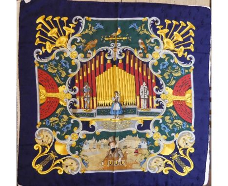 A vintage Hermes silk jacquard scarf depicting a musical design printed upon a treble clef jacquard: 'Orgauphone et Autres Me