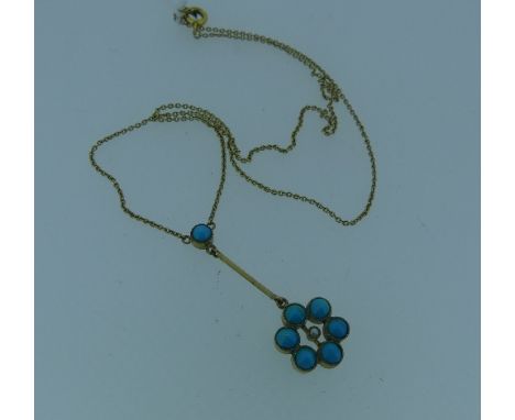 A turquoise flowerhead Pendant, with central seed pearl, all  mounted in 9ct yellow gold and suspended from a gold drop with 