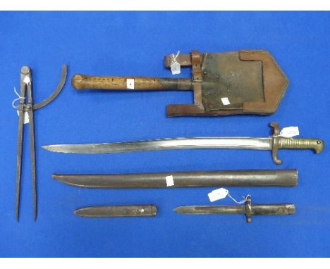 A French Model 1842 Sabre Bayonet, with brass grip and scabbard, together with a WW1 German Army trench shovel &amp; carrier 