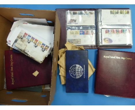 An accumulation of mainly Great British Presentation Packs, and First Day Covers in eight albums and loose (a lot)