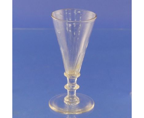 An 18thC ale glass, on a circular foot, 5¼in (113.25cm) high, together with a cut glass ruby-flash wine glass, a small Veneti