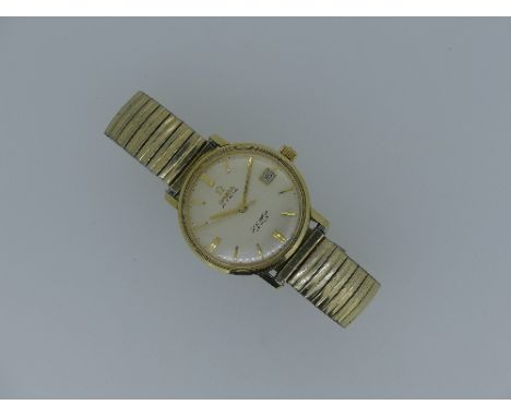 A gentleman's Omega Seamaster De Ville Automatic gold-plated and stainless steel wristwatch, the silvered dial with baton mar