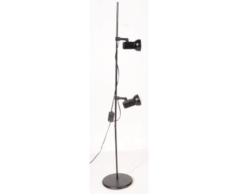 Firstlight Products - A contemporary standard standing floor lamp light. Of metal construction with ebonised tubular column w
