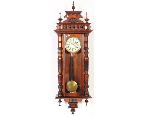 A Victorian 19th century German Gustav Becker Gothic mahogany Vienna regulator 8-day wall clock. Large glass window with deco