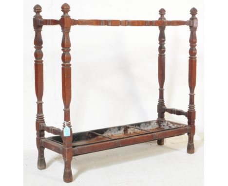 A Victorian 19th century mahogany hall way umbrella / walking stick stand. Of rectangular shape with three sections divided b