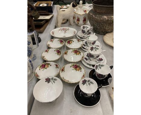 A QUANTITY OF ROYAL ALBERT CHINA TO INCLUDE 'MASQUERADE' CUPS AND SAUCERS, 'OLD COUNTRY ROSES' BOWLS AND 'MOSS ROSE 