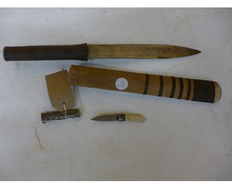 A  MINIATURE BURMESE DHA AND SCABBARD, 4CM BLADE, WITH SILVER DECORATION, TOTAL LENGTH 10CM, AND A BURMESE KNIFE AND SCABBARD