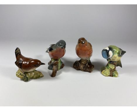 A GROUP OF FOUR BESWICK CERAMIC BIRD MODELS 