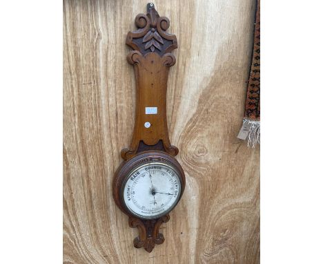A VINTAGE WOODEN CASED WALL HANGING BAROMETER 