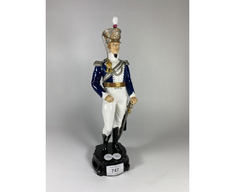 A ROYAL WORCESTER 'OFFICER OF THE LIGHT DRAGON GUARDS' FIGURE 