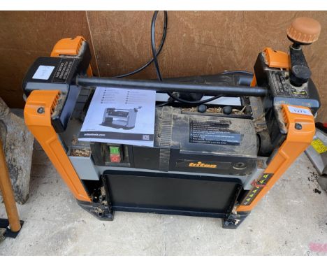 A TRITON ELECTRIC PLANER THICKNESSER COMPLETE WITH INSTRUCTION MANUAL 