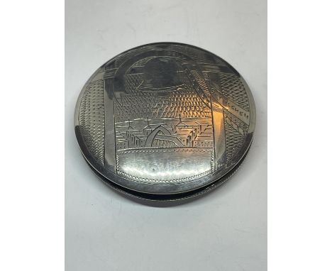 A MARKED SILVER COMPACT 