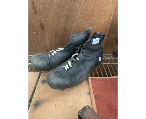 A PAIR OF VINTAGE 1950'S LEATHER FOOTBALL BOOTS 