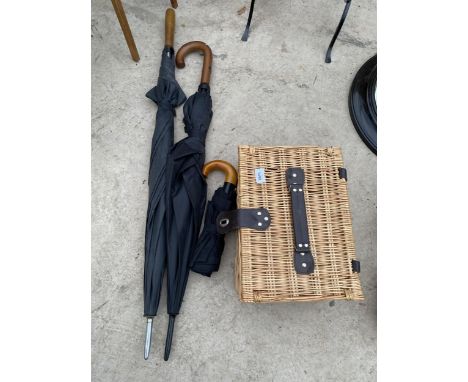 THREE VARIOUS UMBRELLAS&nbsp;AND A WICKER HAMPER BASKET