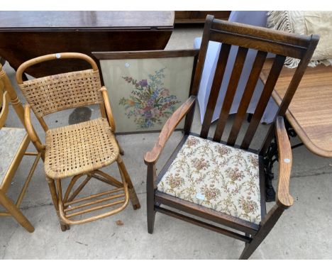 AN EARLY 20TH CENTURY OAK CARVER CHAIR, BAMBOO AND WICKER CHILDS CHAIR AND WOOLWORK FIRESCREEN 