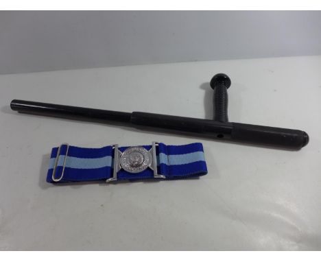 AN EXTENDING NIGHT STICK, LENGTH EXTENDED 61CM AND AN RAF BELT AND BUCKLE (2) 