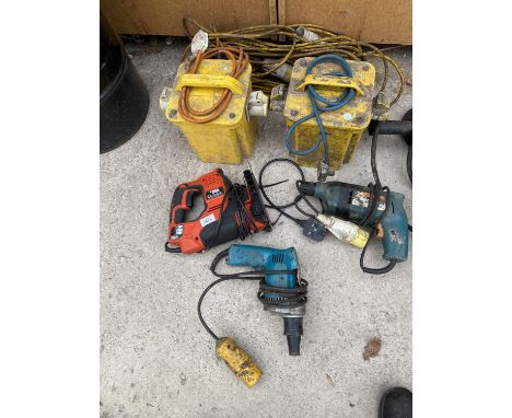 AN ASSORTMENT OF POWER TOOLS TO INCLUDE TWO 110V TRANSFORMERS, A BLACK AND DECKER JIGSAW AND TWO DRILLS ETC 