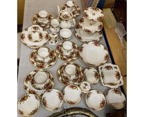 A LARGE THRITY SIX PIECE ROYAL ALBERT OLD COUNTRY ROSES DINNER SERVICE COMPRISING TEAPOT, THREE TIER CAKE STAND, CUPS, SAUCER