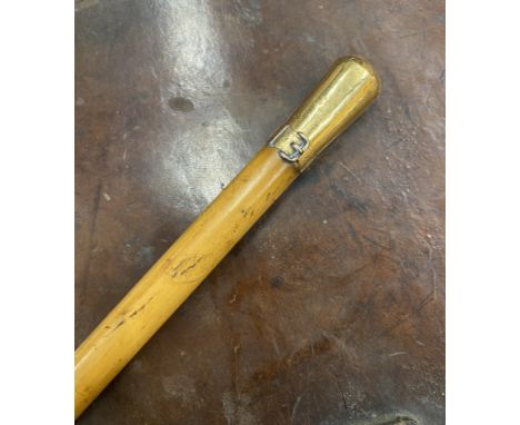 A MILITARY SCOTS FUSILIERS GUARDS SWAGGER STICK WITH AN UNMARKED BUT BELIEVED GOLD FINIAL, (TESTS TO 9CT GOLD) 