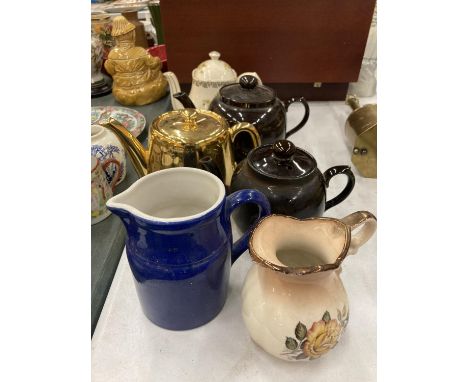 FOUR VINTAGE TEAPOTS TO INCLUDE A ROYAL WORCESTER GOLD COLOURED PLUS TWO VINTAGE JUGS 