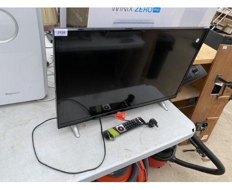 A 32" HITACHI TELEVISION WITH REMOTE CONTROL 