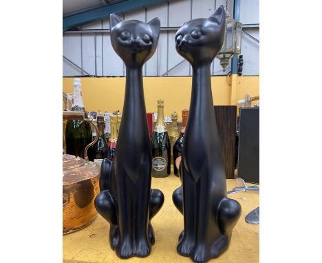 A PAIR OF TALL BLACK CERAMIC CAT MODELS 