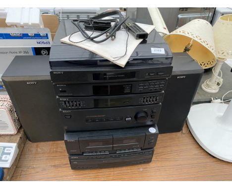 A SONY STEREO SYSTEM TO INCLUDE TURNTABLE, TAPE DECK AND TWO SPEAKERS ETC 