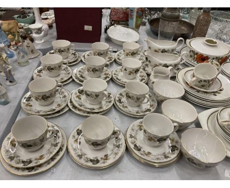 A LARGE QUANTITY OF ROYAL DOULTON 'LARCHMONT' TRIOS PLUS SAUCE BOATS AND SAUCERS, A CREAM JUG AND SUGAR BOWLS 