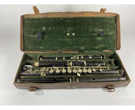 A VINTAGE LEATHER CASED A.H LANGLOIS, LONDON, CLARINET 