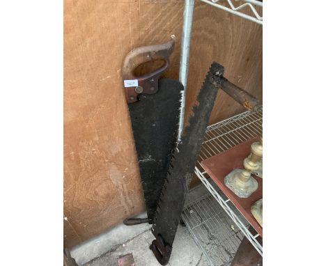 A PAIR OF VINTAGE TWO HANDLED CROSS CUT SAWS 