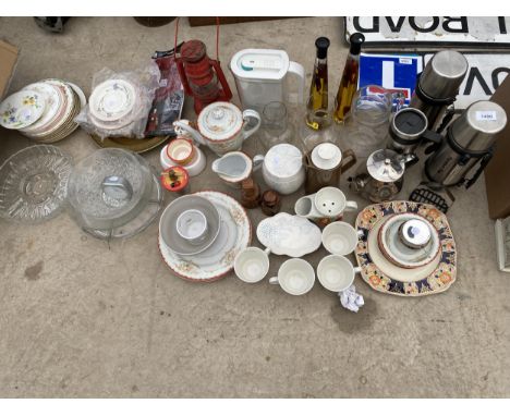 A LARGE ASSORTMENT OF ITEMS TO INCLUDE CERAMIC CUPS, A PARAFIN LAMP AND THERMOS FLASKS ETC 