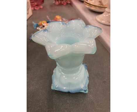 A FRENCH PALE BLUE GLASS CANDLESTICK HEIGHT 9CM 