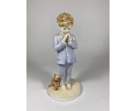 A ROYAL WORCESTER LIMITED EDITION MODEL OF A BOY - 'LUKE' NO. 1377/2000 