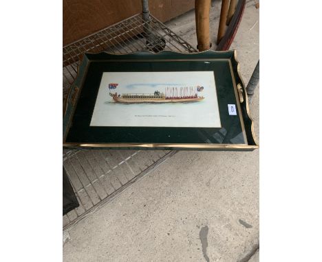 A VINTAGE GREEN AND GILT SERVING TRAY BEARING AN IMAGE OF ' THE BARGE OF WORSHIPFUL COMPANY O FISHMONGERS BUILT 1773' 