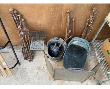 A LARGE ASSORTMENT OF VINTAGE FIRESIDE ITEMS TO INCLUDE TWO COAL BUCKETS, COAL SHOVELS, POKERS AND TONGS ETC 