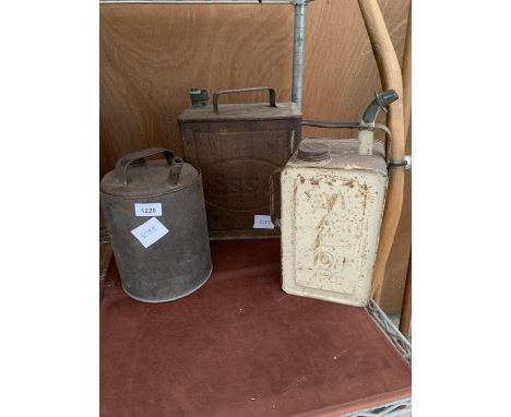 A VINTAGE ESSO FUEL CAN WITH BRASS CAP, A VINTAGE VALOR FUEL CAN AND A FURTHER VINTAGE OIL CAN 