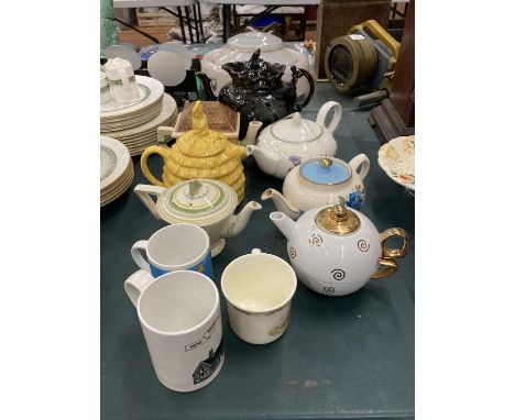 A QUANTITY OF TEAPOTS TO INCLUDE BURLEIGHWARE, SADLER, POOLE, ETC PLUS MUGS 