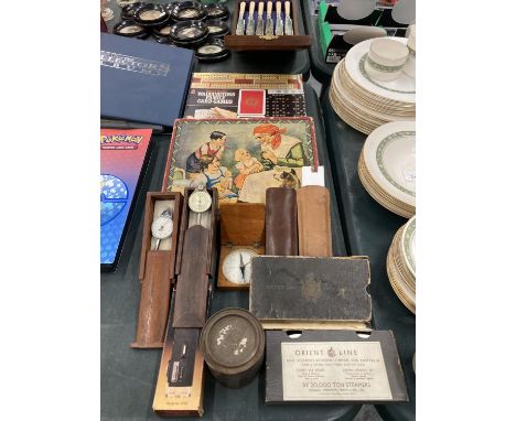 A MIXED VINTAGE LOT TO INCLUDE ORIENT LINE CIRCULAR PLAYING CARDS, BOXED MILEOMETERS, FAMILY CARD GAMES, BOXED, ETC 
