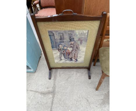 A MAHOGANY FRAMED FIRESCREEN WITH WOOLWORK PANEL 