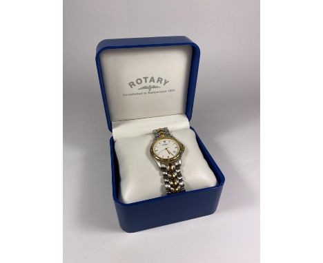 A GENTS BOXED BI-TONE ROTARY DATE WATCH 