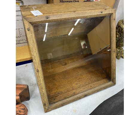 A VINTAGE LIGHT OAK CASED WOODEN SHOP DISPLAY 