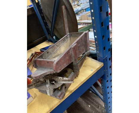 A VINTAGE SEED DRILL 