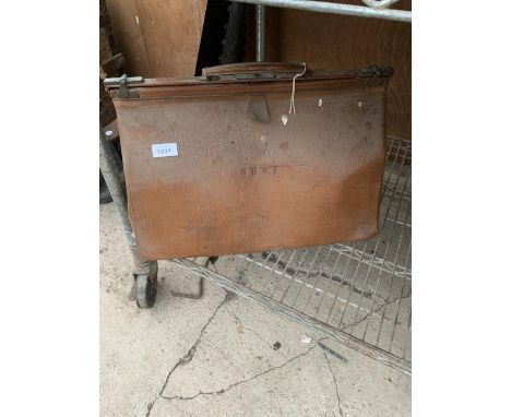 A VINTAGE LEATHER TRAVEL CASE BEARING THE INITIALS 'W.H.W.F' 