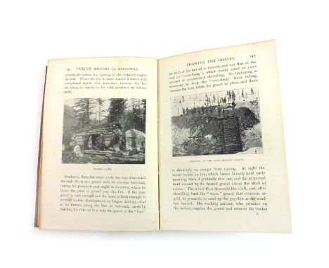 Kirk R. : Twelve Months in Klondike, 1899. 1st. Ed. 8vo Hb. Text & photo plates. Scarce. CONDITION REPORT: Binding dull & wor