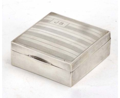 A silver engine turned cigarette box of square form, Birmingham 1929, w. 8 cm CONDITION REPORT: Typical minor dents, wear and