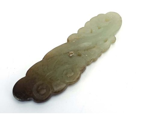 A Chinese celadon/brown jade carving modelled as a lingzhi mushroom, l. 19.5 cm